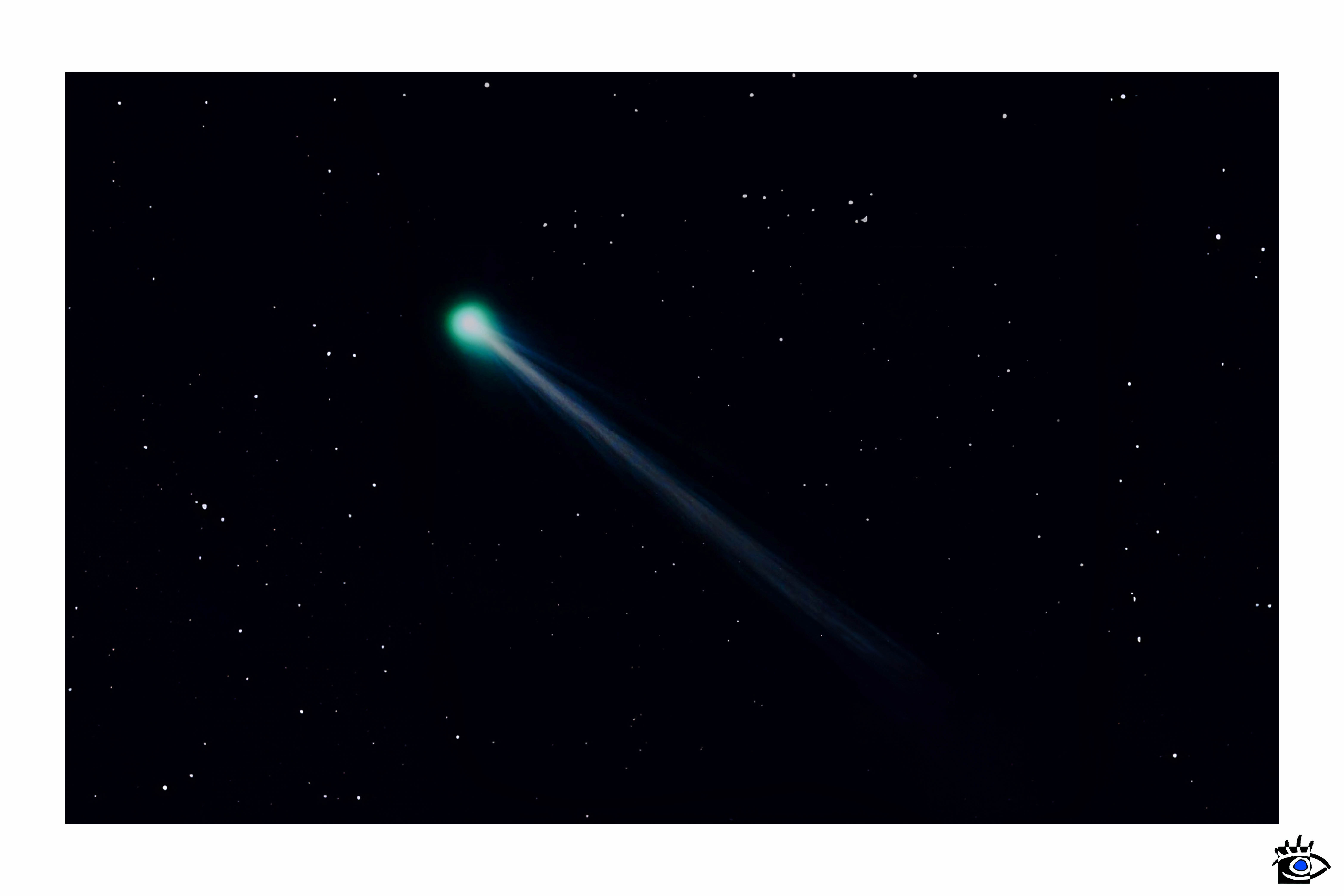 Fotografia della cometa C/2023 A3 (Tsuchinshan-ATLAS) con coda luminosa visibile nel cielo notturno, ottobre 2024